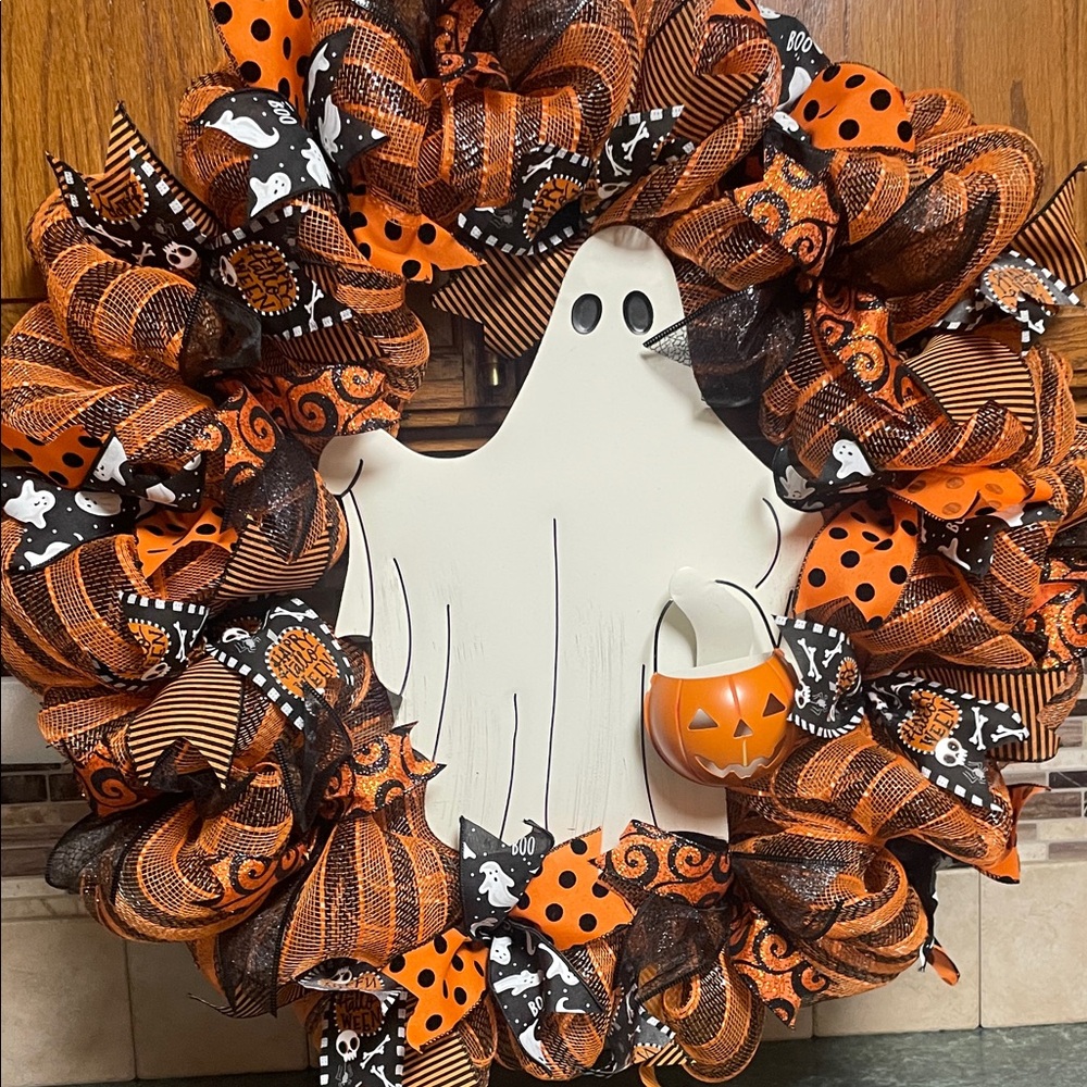Deluxe Halloween Metal Ghost Wreath with Orange and Black Accents